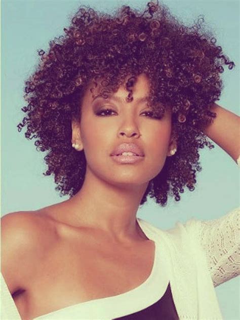 Shoulder length blonde hair with dense weaves at bottom and straight bangs on top looks stylish. Short curly weave afro hairstyles for black women