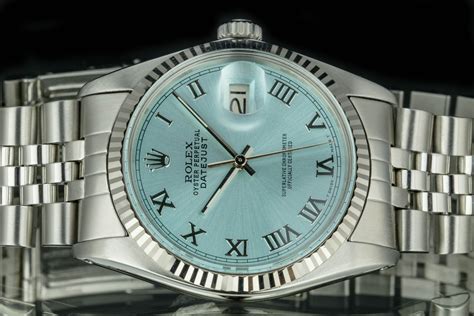 Rolex Mens Datejust Stainless Steel Ice Blue Roman Numeral Dial Fluted