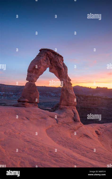 Sunset At Delicate Arch Located In Arches National Park Utah Stock