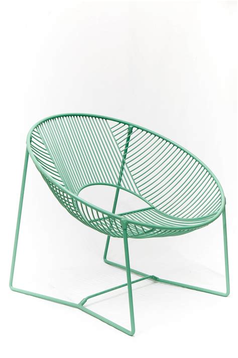 Wire chairs offer modern and minimalist style. Handcrafted Outdoor Cali Wire Lounge Chair, Powder-Coated ...