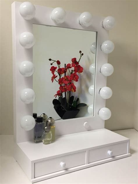 The supplies required for the project include a frameless mirror, three vanity light strips, a bunch of light bulbs, plywood and some basic. Hollywood Vogue Lighted Makeup Vanity Mirror with Drawers ...