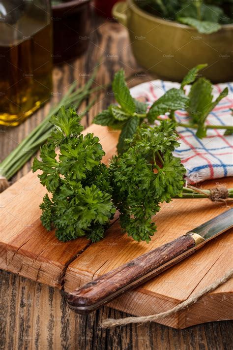 Find images of parsley leaves. Curly parsley leaves ~ Food & Drink Photos ~ Creative Market
