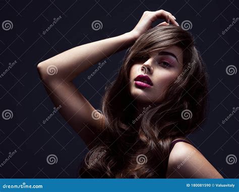 Face Of A Beautiful Woman With Long Brown Curly Hair Fashion Model With Wavy Hairstyle Stock