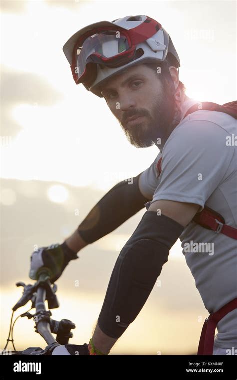 Portrait Of Male Mountain Biker In Sunlight Stock Photo Alamy