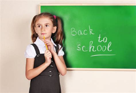 Beautiful Little Girl Standing Near Blackboard Stock Image Image Of