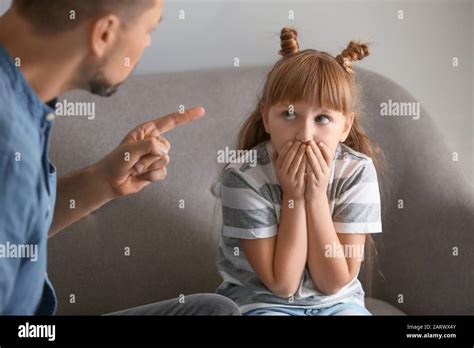 Father Scolding His Little Daughter At Home Stock Photo Alamy