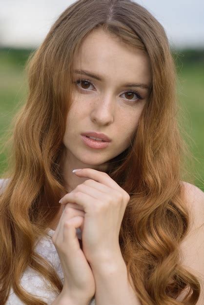 Premium Photo Portrait Of A Beautiful Young Redhead Girl In Nature