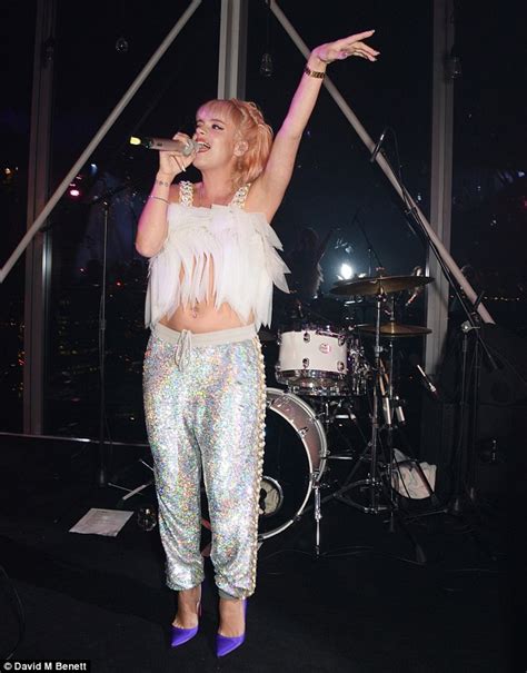 Lily Allen Performs In Bizarre Midriff Baring Feather Crop Top Daily
