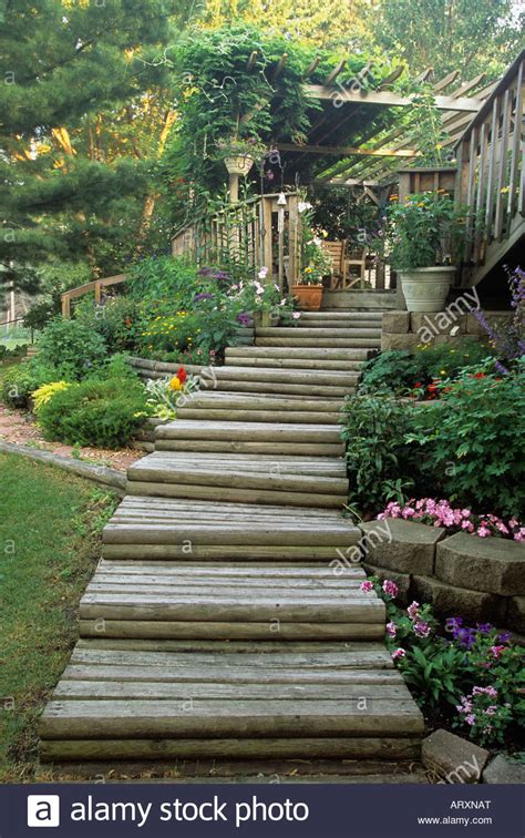 Steps Through Terraced Flower Beds Lead To Lower And Upper Decks Of