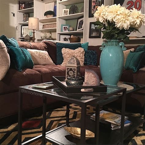 This can be done by adding or adjusting certain element on your room, like color combination, putting decoration or interior accessories. Cozy brown couch with teal accents, turquoise and brown ...