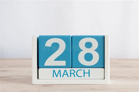March 28th Day 28 Of Month Daily Calendar On Wooden Table Background