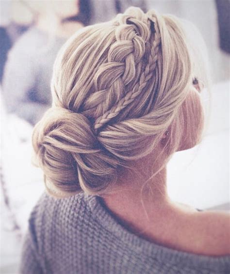 The Most Perfect Braided Updo Twisted Into An Elegant Low Bun This