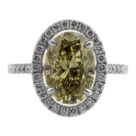 Gia Certified 075ct Pear Shaped Natural Fancy Vivid Orangy Yellow