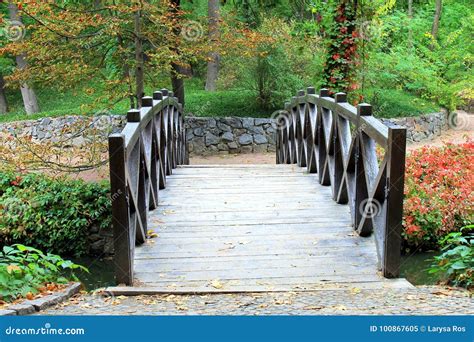 Beautiful Wooden Bridge Across A Small River In The Autumn Sofia Park