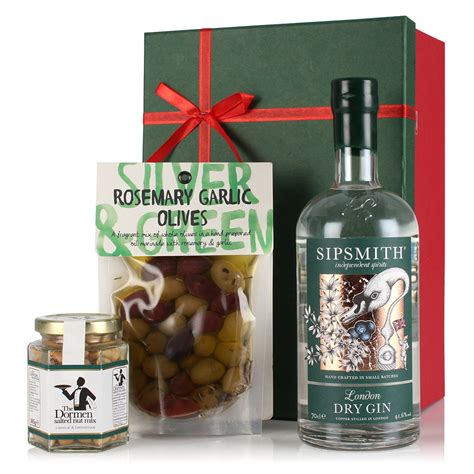 Our handcrafted baskets never fail to impress despite the low price. Send a Luxury hamper of Gin and Nibbles Box | Gifts ...
