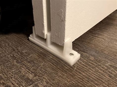If you are installing a new track, you will need to install a guide wheel on the bottom of the door. Sliding-Closet-Door-Floor-Guide - The Palette Muse