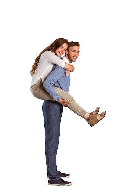 Premium Photo Portrait Of Smiling Man Carrying Woman