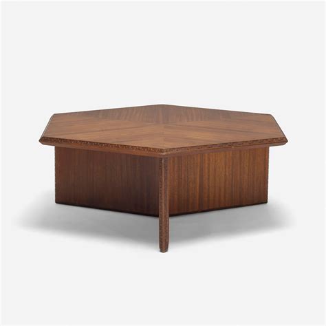 The table has the original stampings on the. Coffee Table, Model 453-C by Frank Lloyd Wright for ...