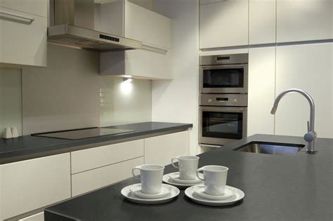 Its a soft white with light grey veins giving just a hint of a pattern. Grey Quartz Countertops for Kitchens - HomesFeed