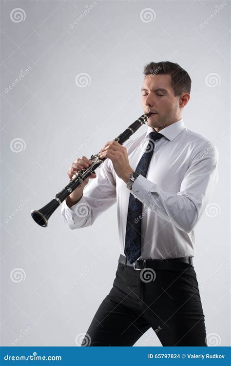 Young Man Playing The Clarinet Stock Photo Image Of Background