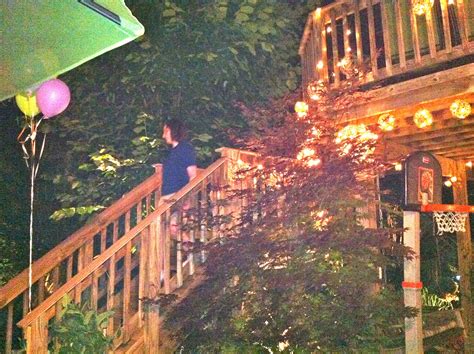 People chilling around fire in backyard at night. Backyard at Night (With images) | Backyard, Grounds, Fair ...