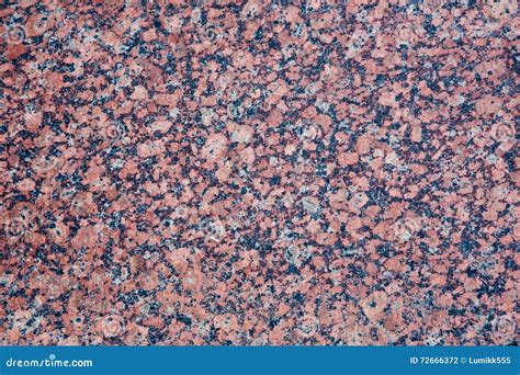Stone Background Of Mottled Red Granite Igneous Rock Stock Photo