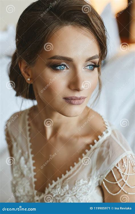 Portrait Of Fashionable Beautiful And Sensual Brown Haired Model Girl With Professional Bright