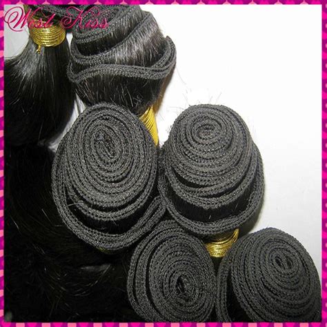 Curling your hair with heat. WestKiss Filipino loose Spiral Curl Wavy Virgin Weave Thick 4 bundles Admire RAW Bouncy Blossom ...