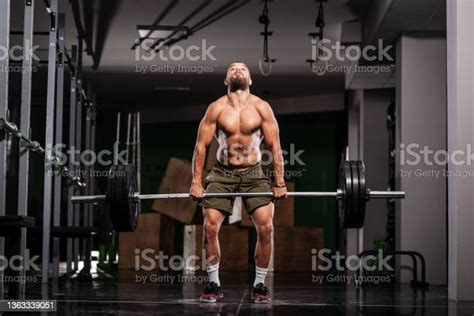 Muscular Athlete Lifting Very Heavy Barbell Stock Photo Download