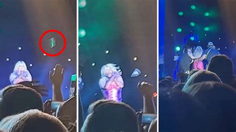 bebe rexha collapses on stage after fan throws phone at her face