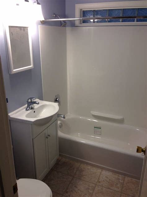 New and very small 5x7 foot bathroom. Flooring is Allure ...