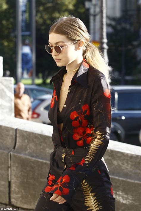 Gigi Hadid Flashes Her Lacy Black Bra In A Chic Floral Suit As She Steps Out During Pfw Daily