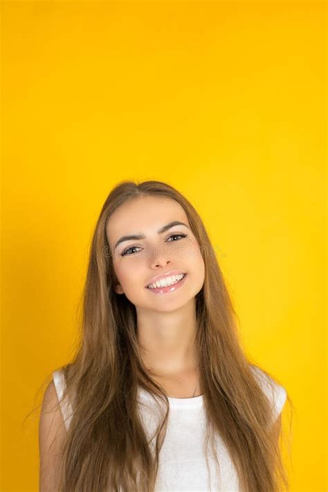 Headshot Of Pleasant Looking Friendly Cute Young Female Person Smiles
