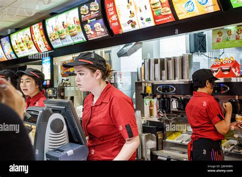 Mcdonalds fast food restaurant counter teen hi-res stock photography