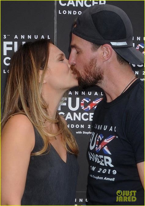 Stephen Amell And Wife Cassandra Share A Kiss Arriving At F Cancer
