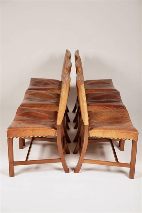 With its clean, rectilinear form, the barcelona dining table provides a subtle beach chair: Kaare Klint, Set of Six 'Barcelona' Dining Chairs, Model ...
