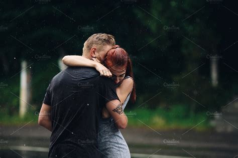 Beautiful Couple Hugging In The Rain High Quality People Images ~ Creative Market