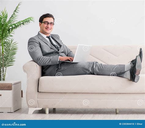 Young Businessman Lying On The Sofa Stock Photo Image Of Male