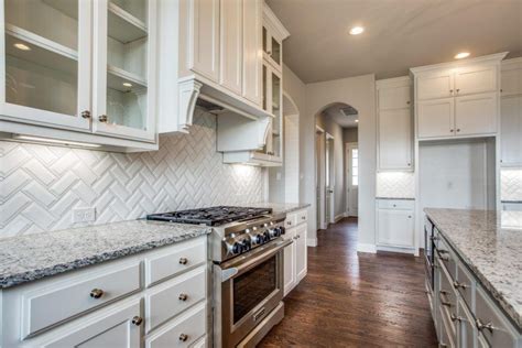 Enviable designs 30 of 33 Backsplashes white tile herringbone backsplash kitchen ...