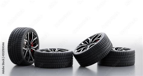 Set Of Wheels With Modern Alu Rims On White Background Stock Photo