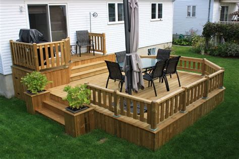 Further in you will seat another cozy seating area for guest that want to view the fire pit without being too close. Contemporary Deck - Contemporary - Terrace - Montreal