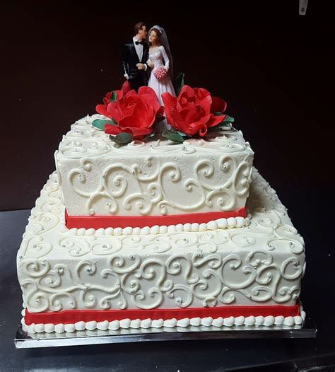 Book your wedding cake early. Buttercream wedding cake with red gum paste flower # ...