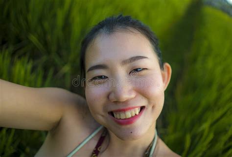 Young Happy And Beautiful Asian Woman Taking Selfie Photo Outdoors Cheerful Chinese Girl In