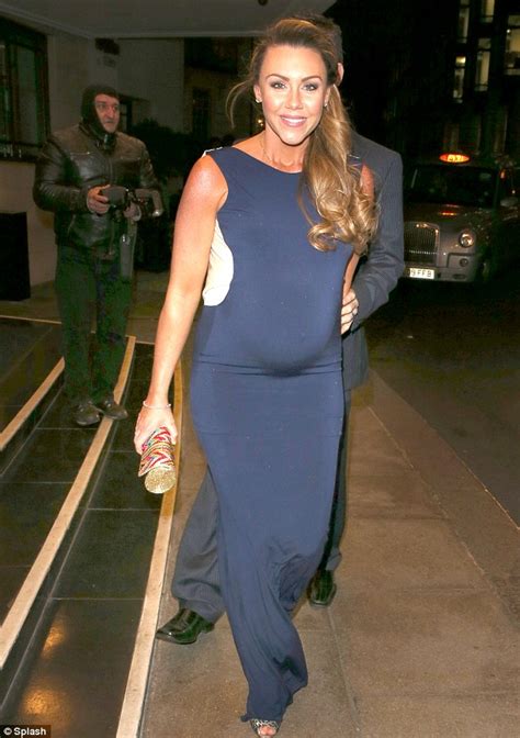 Michelle Heaton Is Radiant As She Shows Off Her Bump In Clinging Dress For Party With Husband