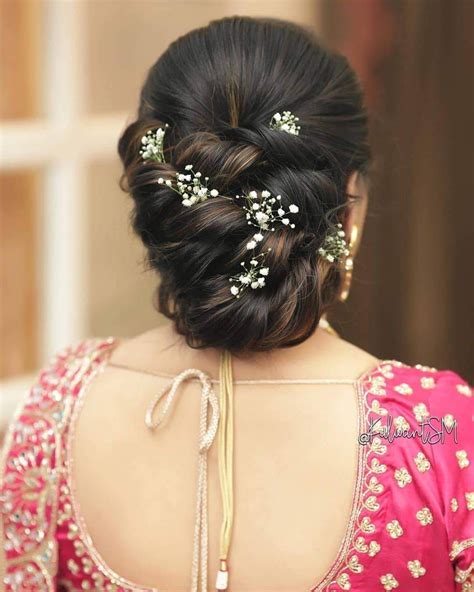 Top 81 Indian Bridal Hairstyles To Bookmark Right Away Wedbook Bridal Hair Buns Front