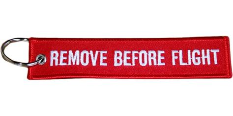 I like the pull to eject one as well. Keyrings: Remove Before Flight Red