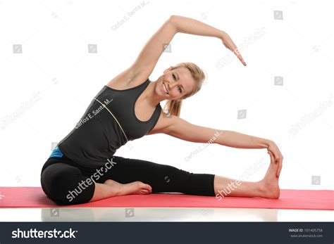 Young Woman Working Out Isolated On A White Background Stock Photo