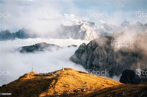 Misty Mountains In Tre Cime Di Lavaredo Dolomites Italy Stock Photo