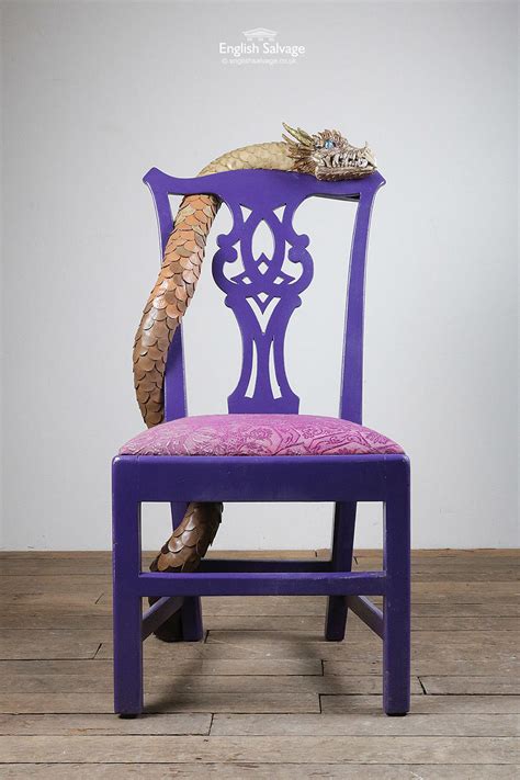 This chair planter is the perfect way to repurpose a chair with a broken seat! Quirky upcycled purple dragon chair