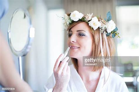 Bride Putting On Make Up Photos And Premium High Res Pictures Getty